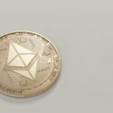 round gold colored ethereum coin