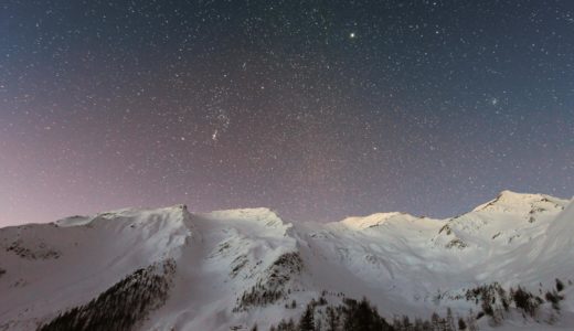 mountain covered snow under star